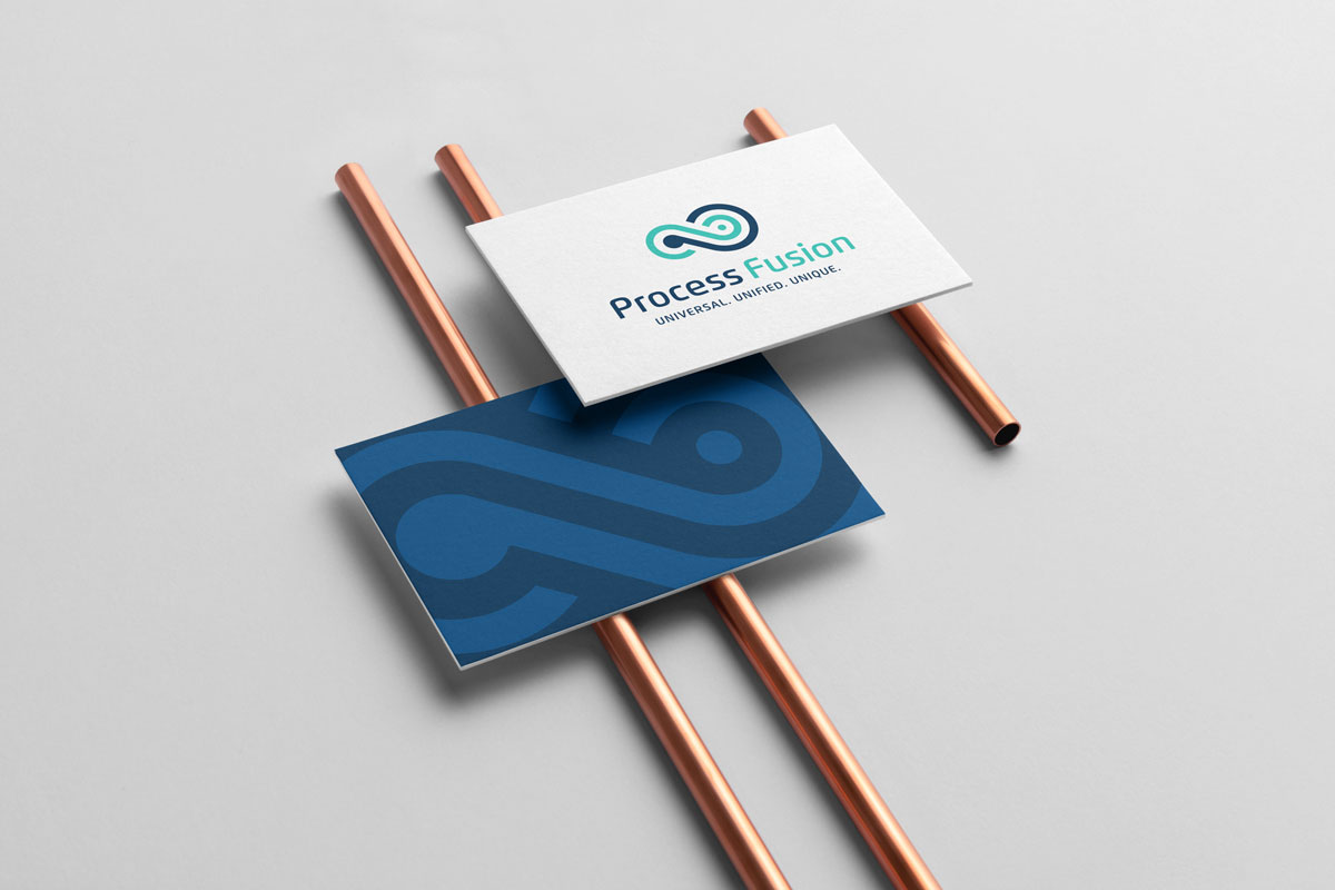 process fusion logo shown on two business card placed on copper pipes