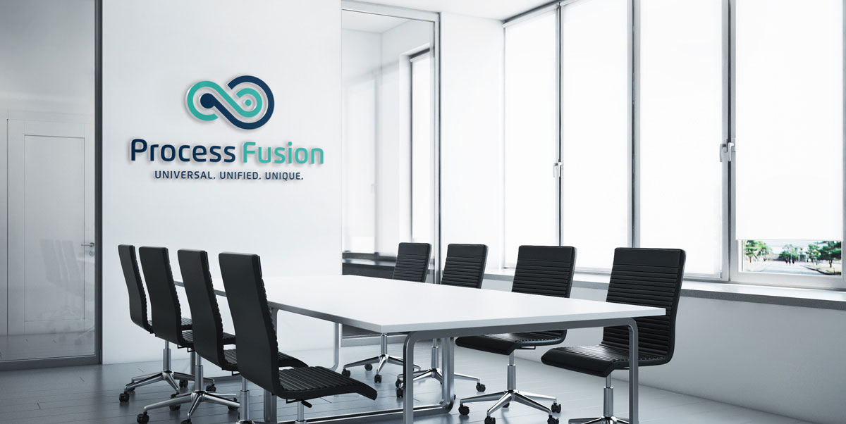 process fusion logo on the wall of a large meeting room