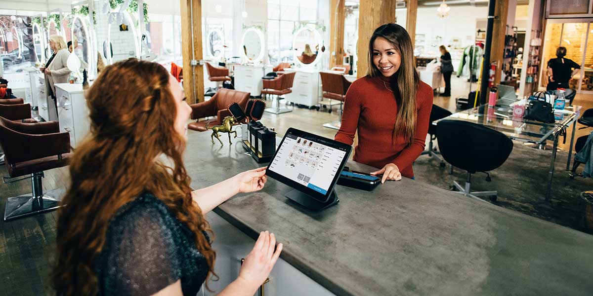 Low touch funnel for sales - woman at counter buying