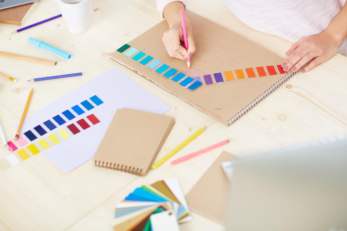 designer working colour swatches for branding