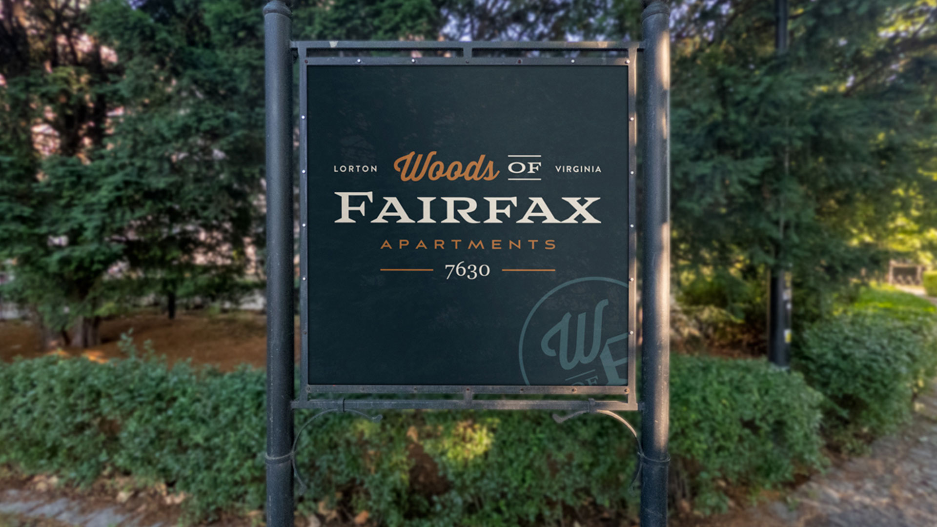 woods of fairfax appartments sign